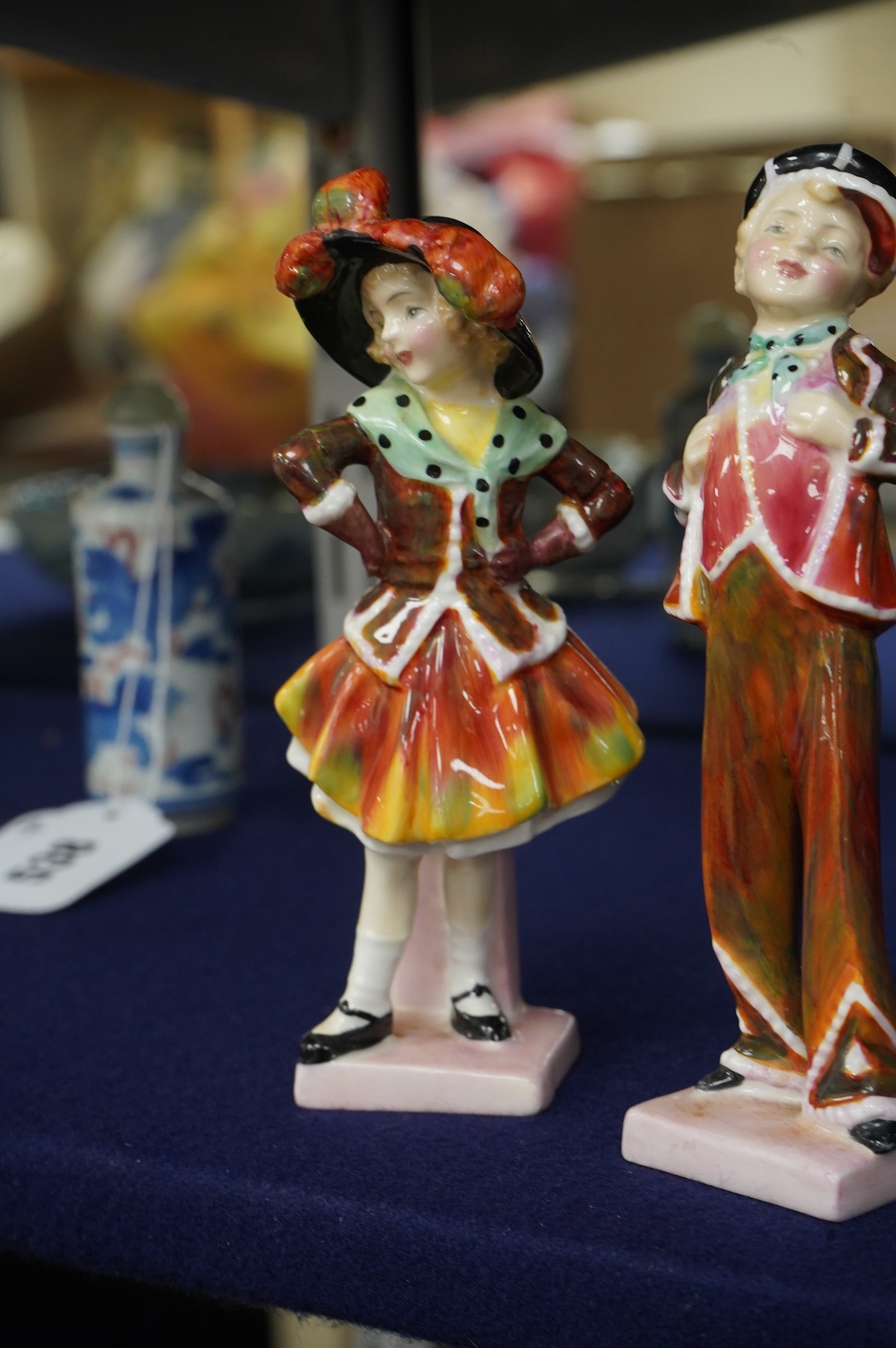 A pair of Royal Doulton figures, Pearly Boy, HN2055, and Pearly Girl, HN2036, 15cm high